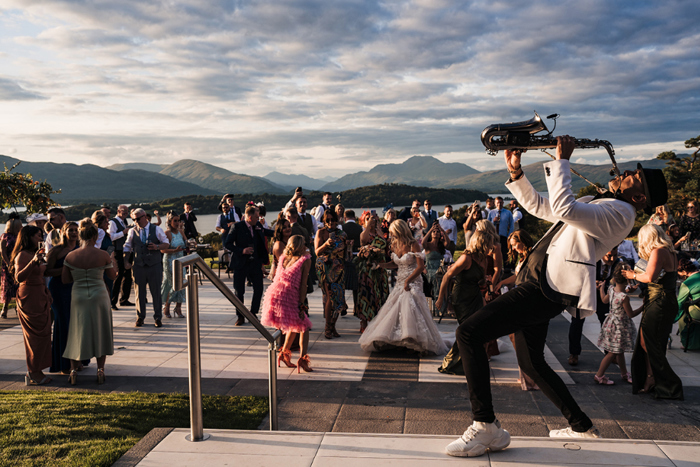 Saxingh plays to guests on the Outdoor Dancefloor