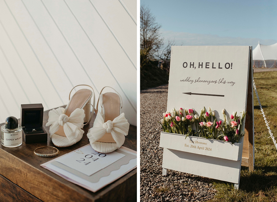 a close up of shoes, perfume and jewellery on a dark wooden surface on left. A wooden A-frame wedding sign that read 'Oh hello' and has bottom section filled with pink and white tulips