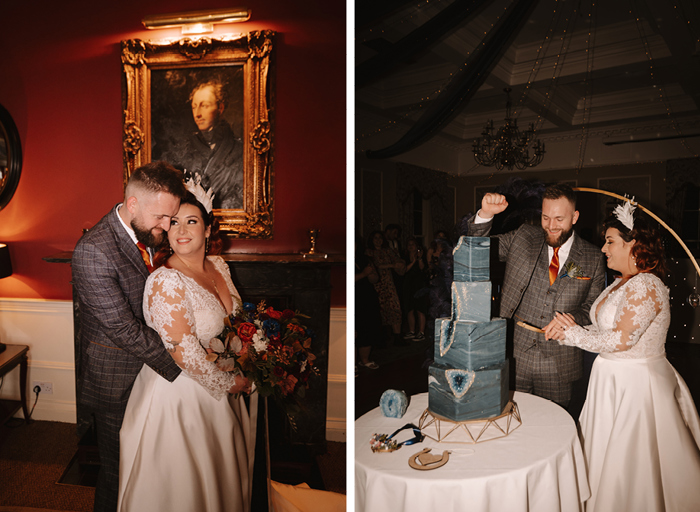 newlywed couple stand together smiling at each other on left and cut a four tier blue geometric shape wedding cake on right