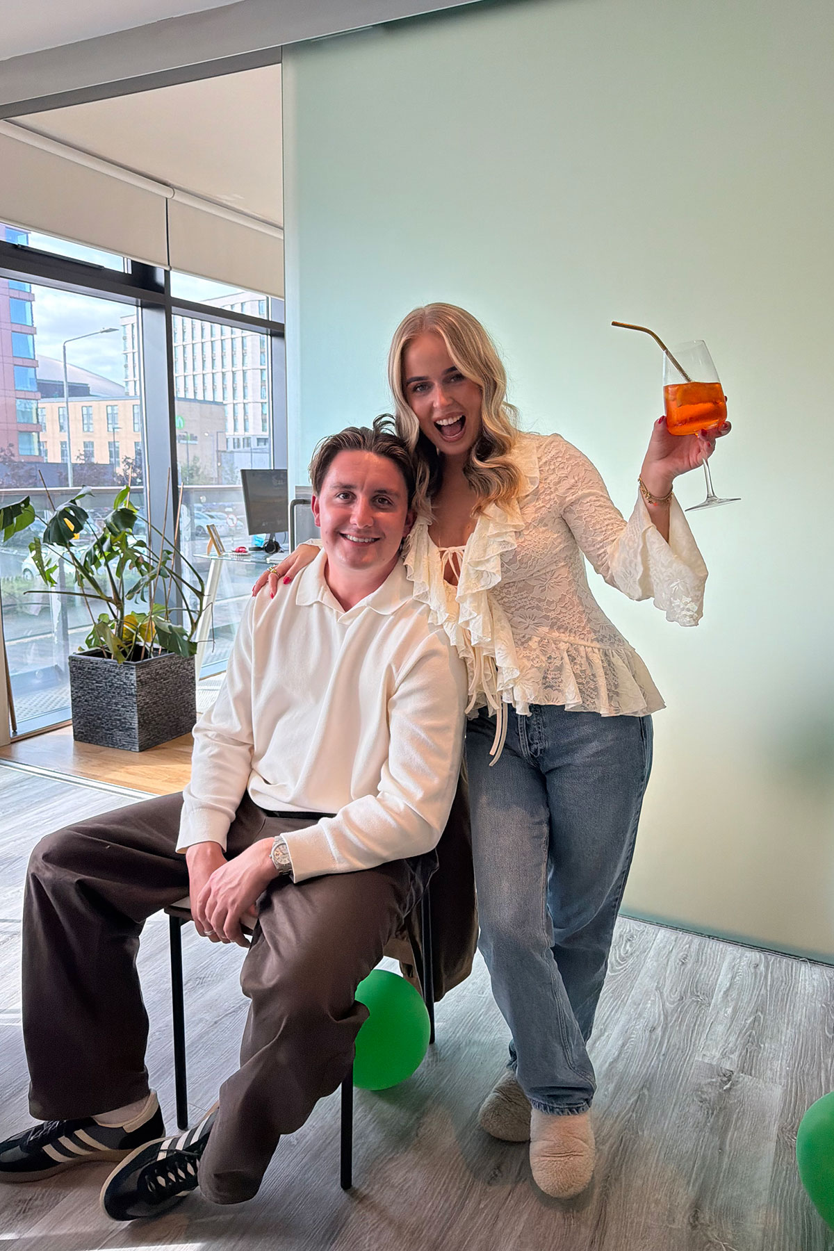 Ruby McFarlane and Oskar Wilkie together during their wedding planning, with Ruby holding a drink.