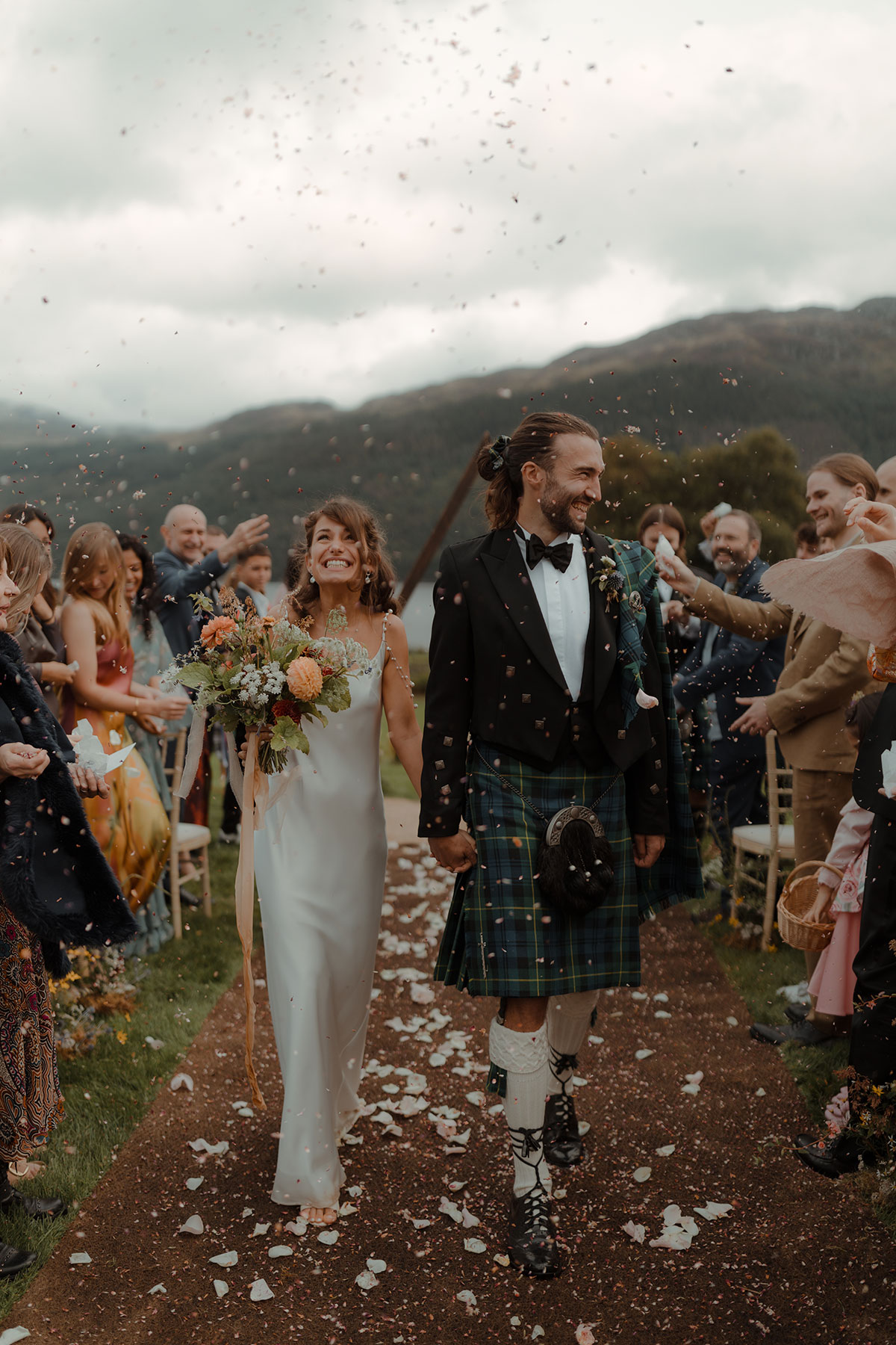 Carrick Castle Estate wedding bride and groom confetti throw outdoor ceremony on Loch Goil