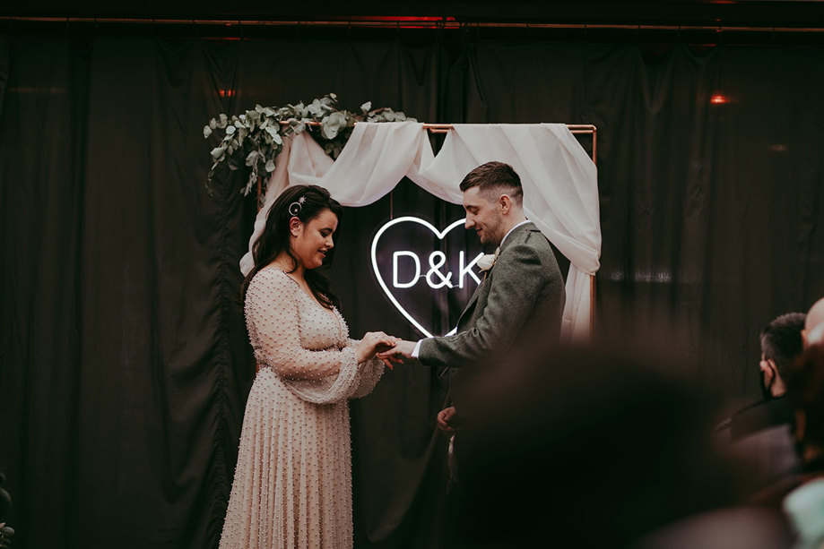 Wedding Ceremony At Barras Art And Design Baad Ring Exchange And Neon Sign