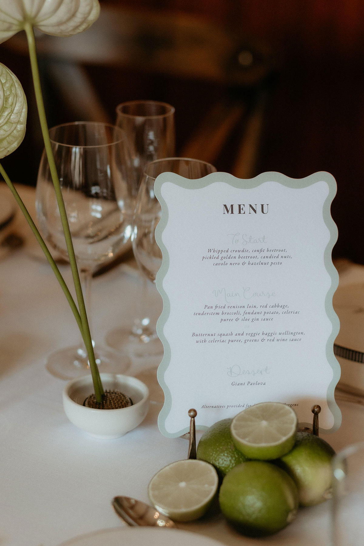 Wedding menu card with limes and modern table styling at Rosebery Steading reception, Midlothian wedding venue.