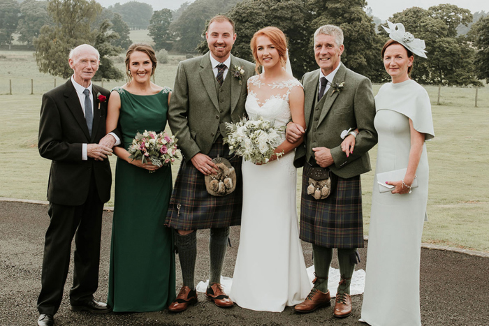 A Bride, Groom And Family At Cornhill Castle