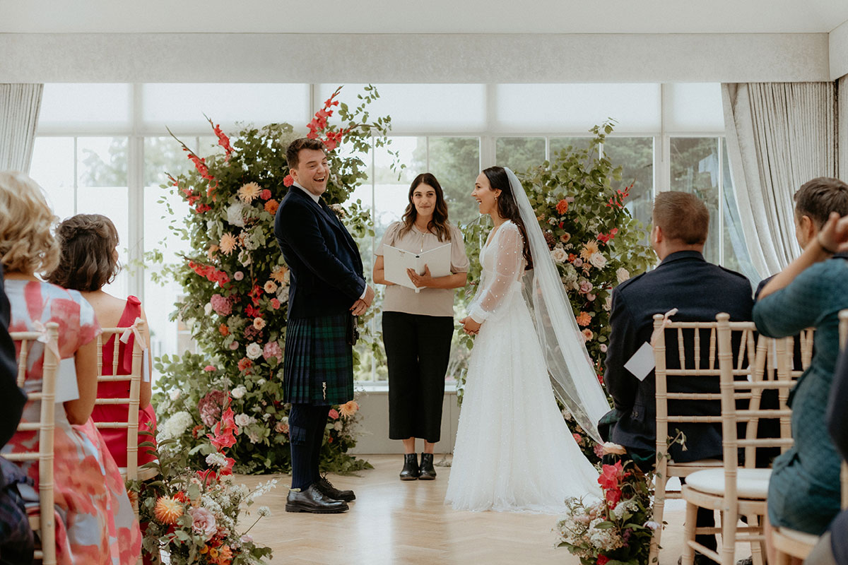 a wedding ceremony at carlowrie castle