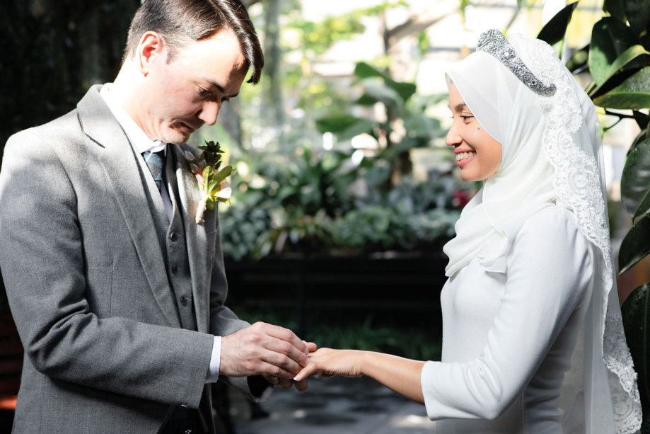 Exchange Of Wedding Rings At Inverness Botanic Gardens