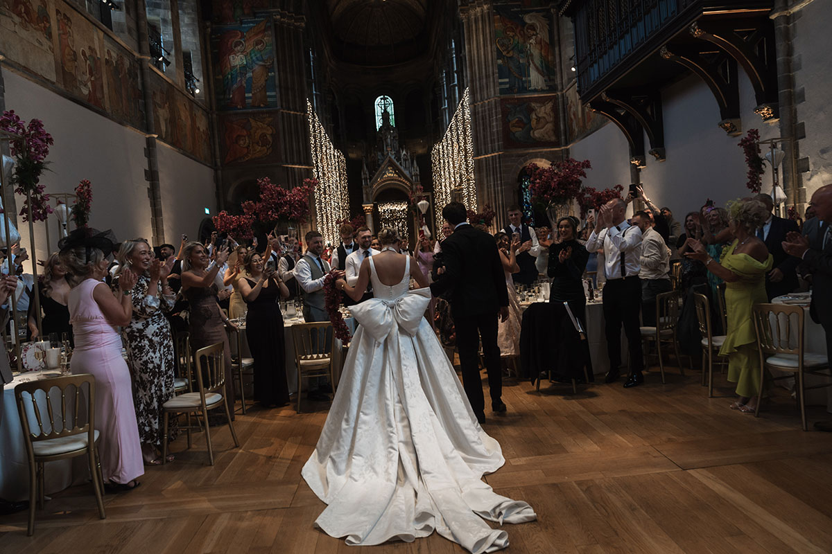 Wedding reception setup inside Mansfield Traquair with candlelit tables and ambient lighting
