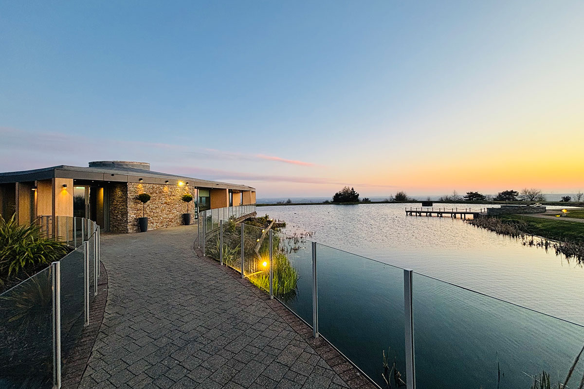 exterior of the Vu Waterlily suite sustainable central Scotland wedding venue at sunset