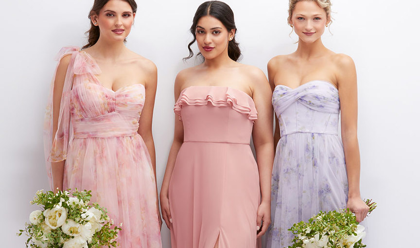 a group of women in Dessy bridesmaid dresses