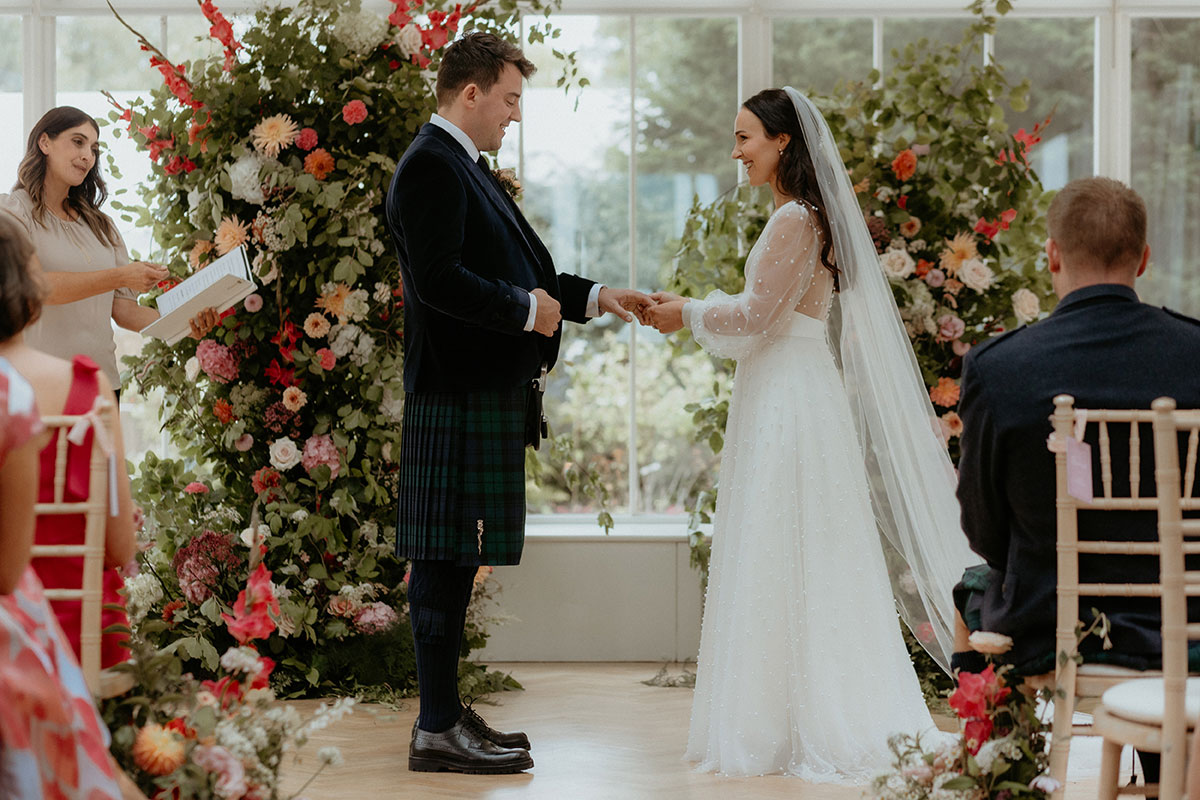 a wedding ceremony at carlowrie castle