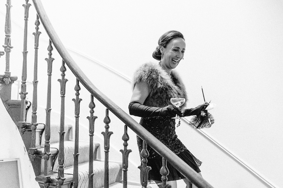 Bride Wearing Art Deco Clothing Walking Down Stairs