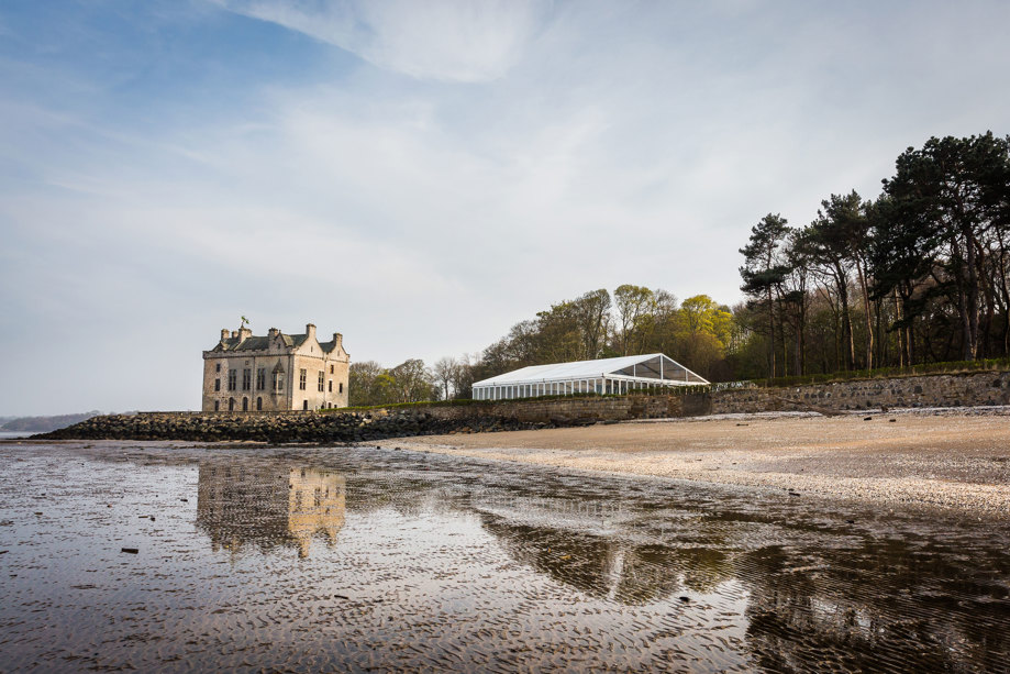exterior of barnbougle castle with sand in focus