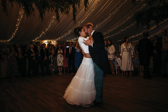 Two People Kissing Under Fairylights In A Marquee on Boswells Estate