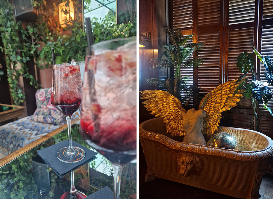 red drinks in wine glasses with a bath with a mannequin with angel wings and disco ball
