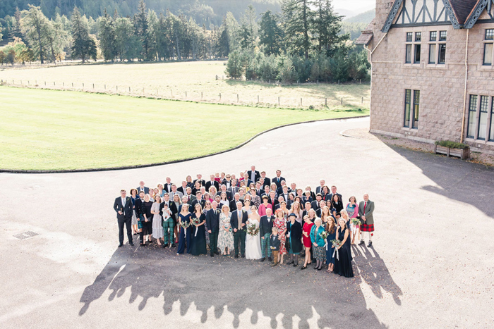 Aerial group shot of guests outside Mar Lodge