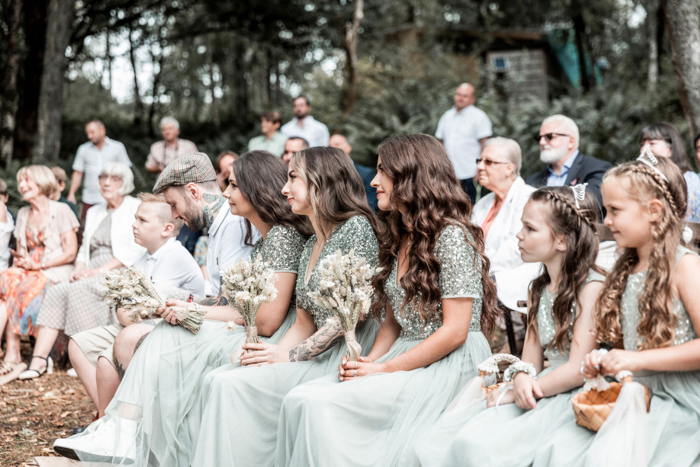 Bridesmaids seated during ceremony