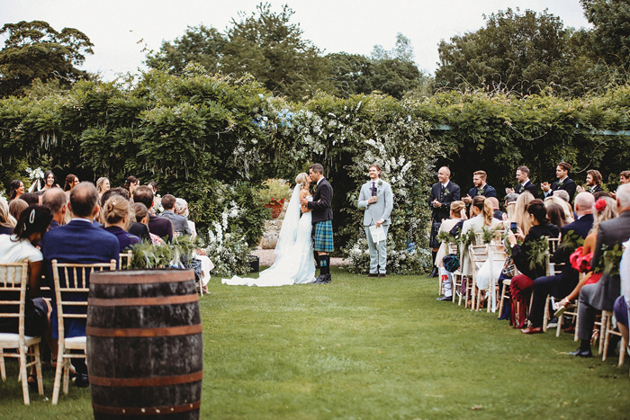 An Outdoor Wedding Ceremony At Winton Castle