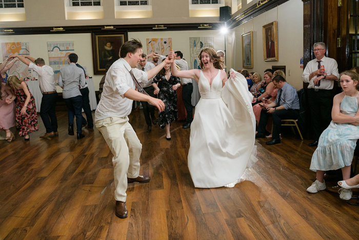 Bride dances with guests at the wedding ceremony