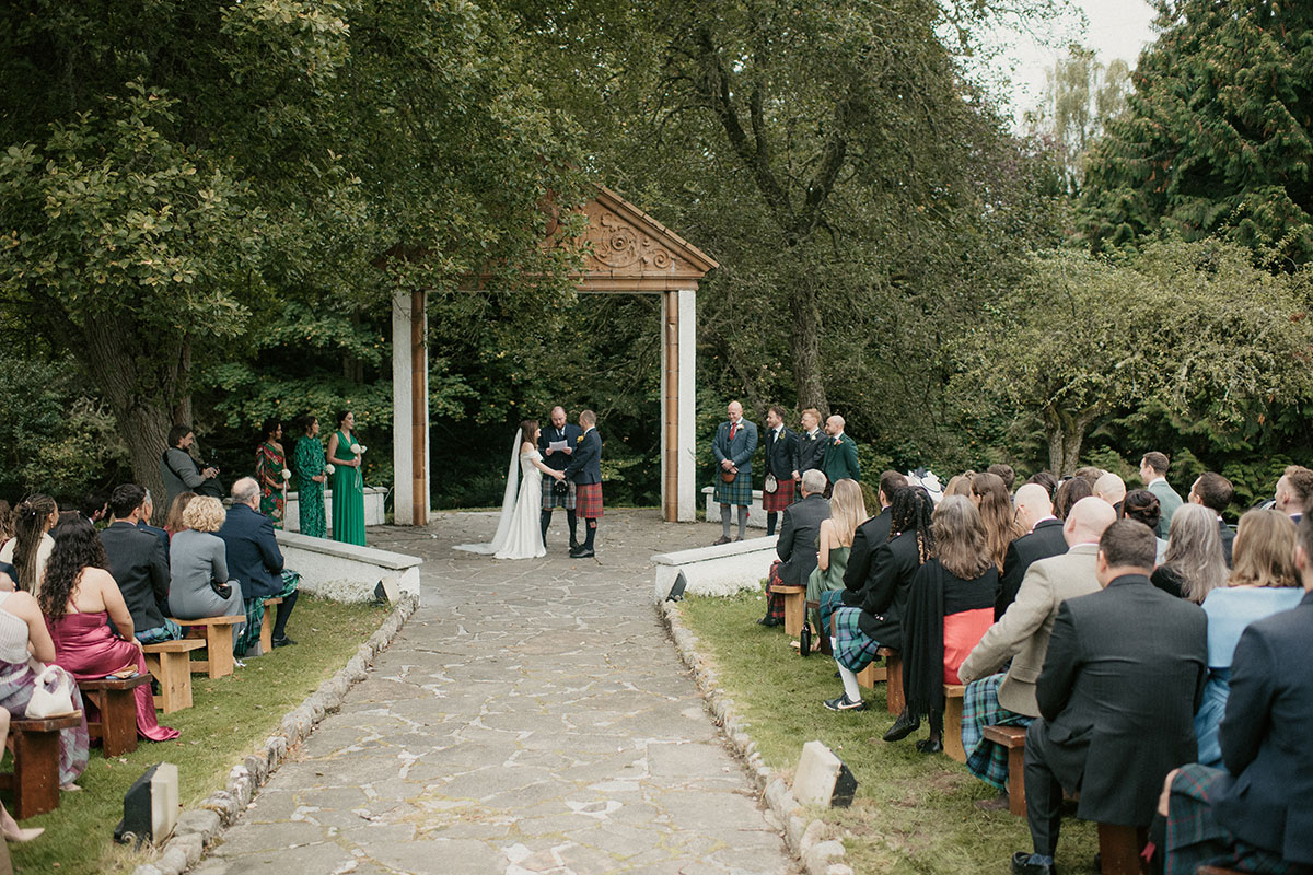 outdoor wedding ceremony at pagoda at Achnagairn Castle