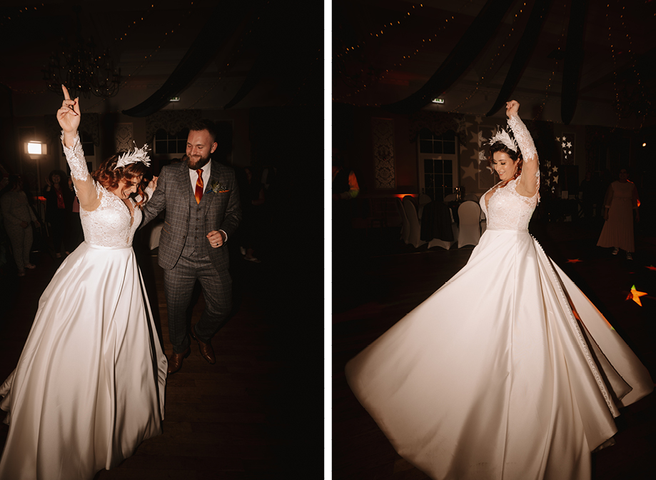 a bride spins in her long white dress with her hand up in celebration with the groom standing next to her