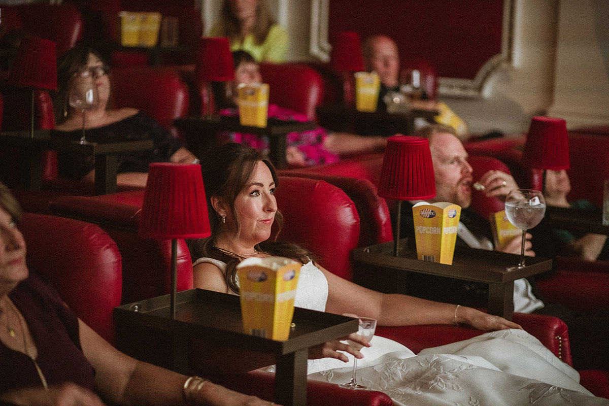 people seated at a red movie theatre at the Scotsman Picturehouse Edinburgh