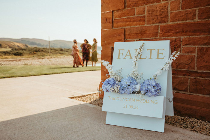 welcome sign reading failte for guests during wedding at dougarie boathouse