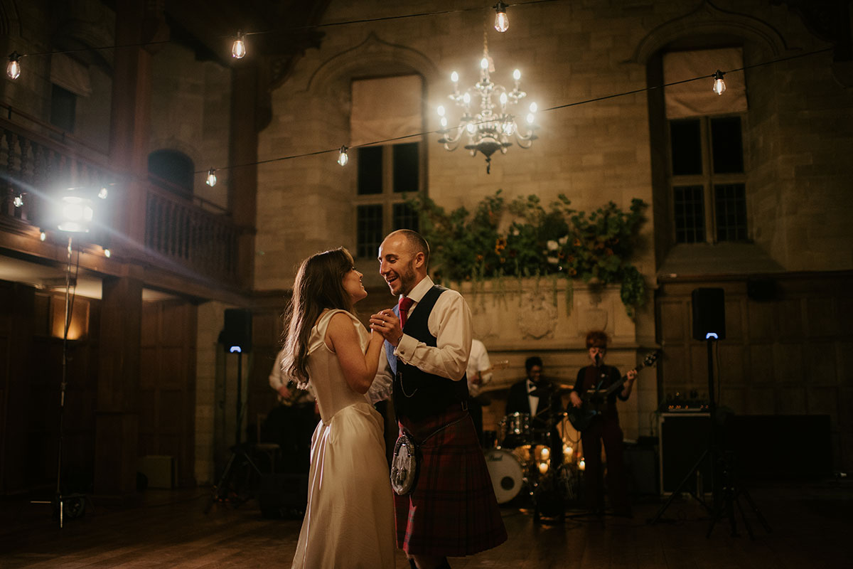 first dance of bride and groom in ballroom at Achnagairn Castle