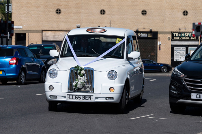 White Glasgow Wedding Taxi