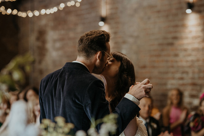 Couple kiss during the ceremony
