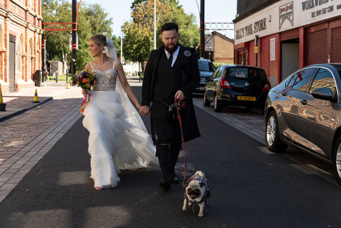 Bride And Groom Walking Pug Around Glasgow Barrowlands