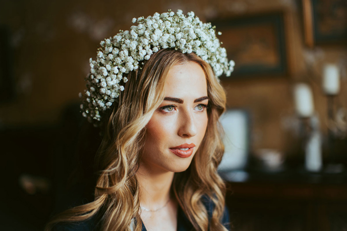 Bride wears gypsophila flower crown