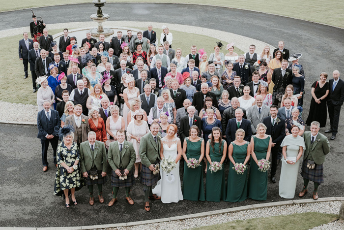 An Aerial Image Of Wedding Party At Cornhill Castle