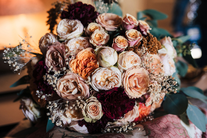 Bridal bouquet with white, red, orange and pink flowers