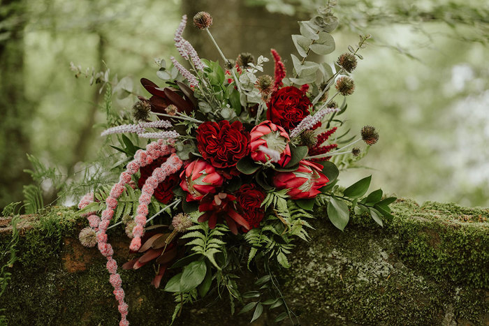 Red and pink bouquet with foliage details