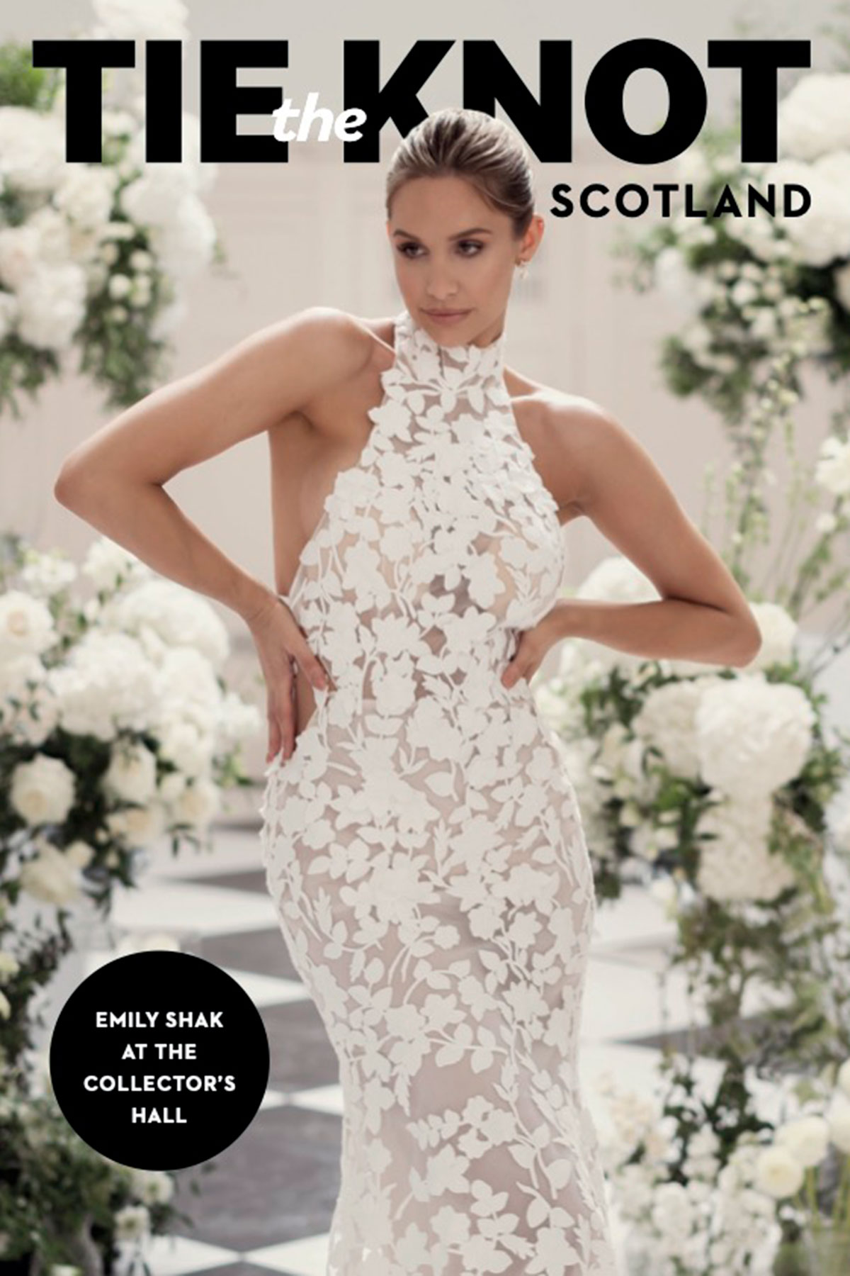 Scottish model Emily Shak wears a lace halterneck bridal gown at The Collector’s Hall, Glasgow