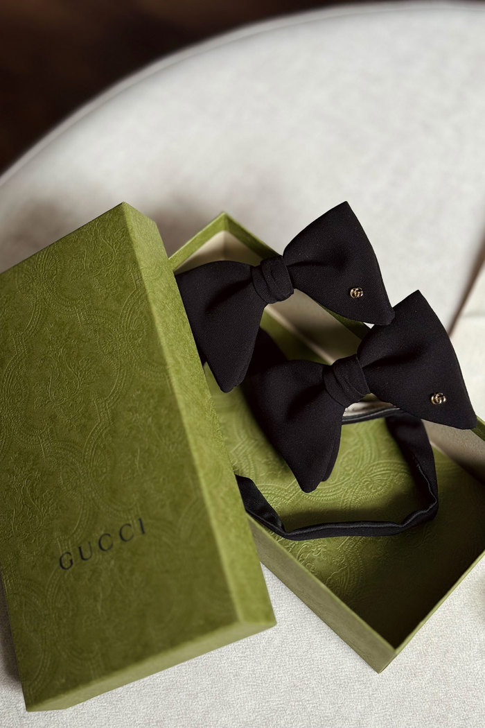 black gucci bow ties in green box
