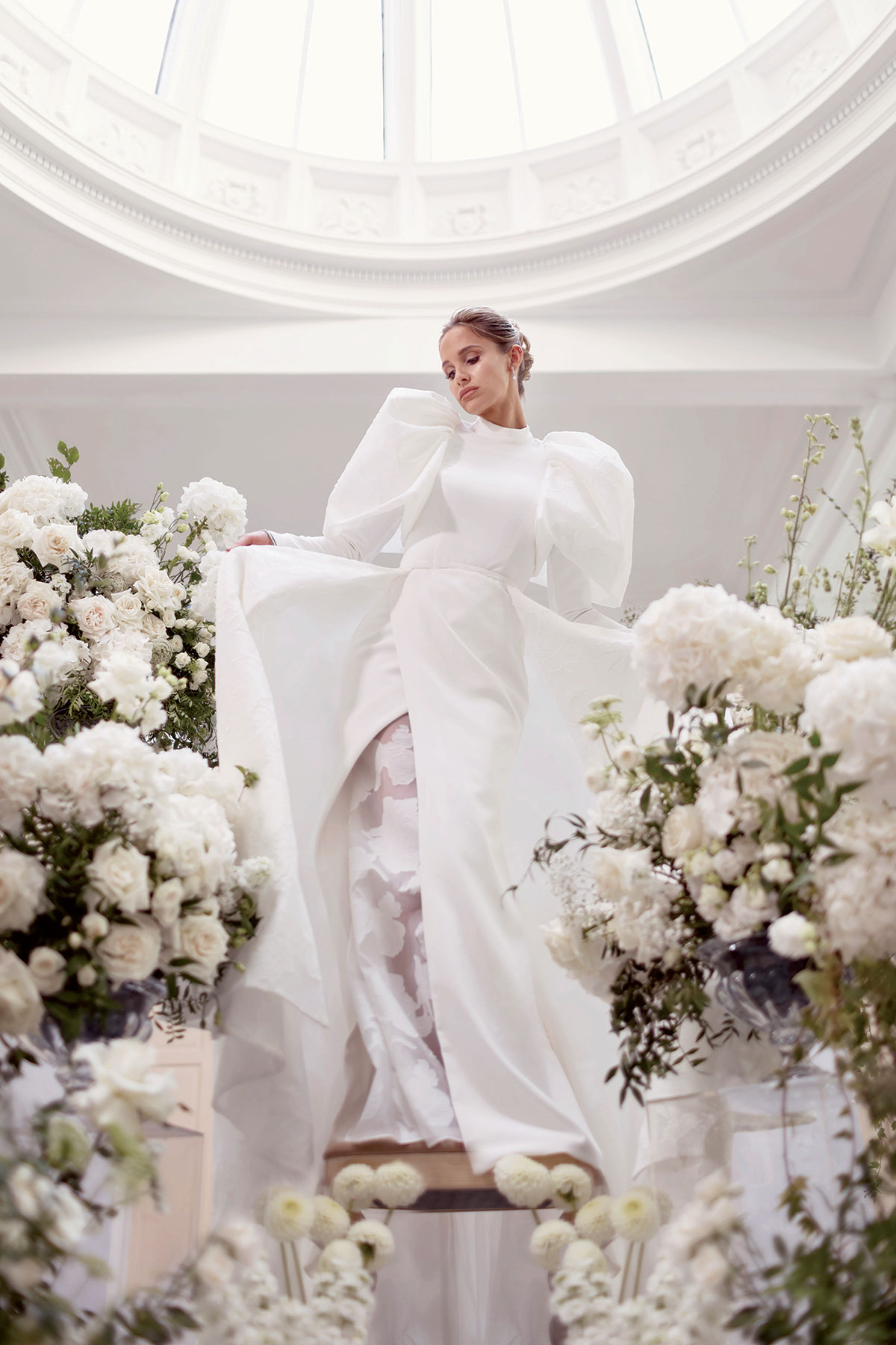Bridal photoshoot in The Collector’s Hall Glasgow with model Emily Shak wearing a statement puff-sleeve white wedding dress