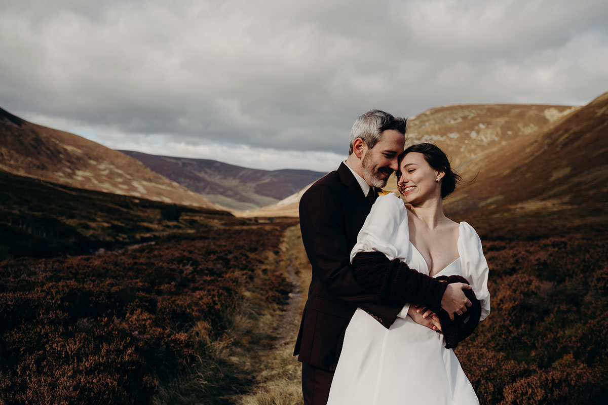 Mar Lodge Estate wedding, a bride and groom amid the mountain scenery of the Cairngorms
