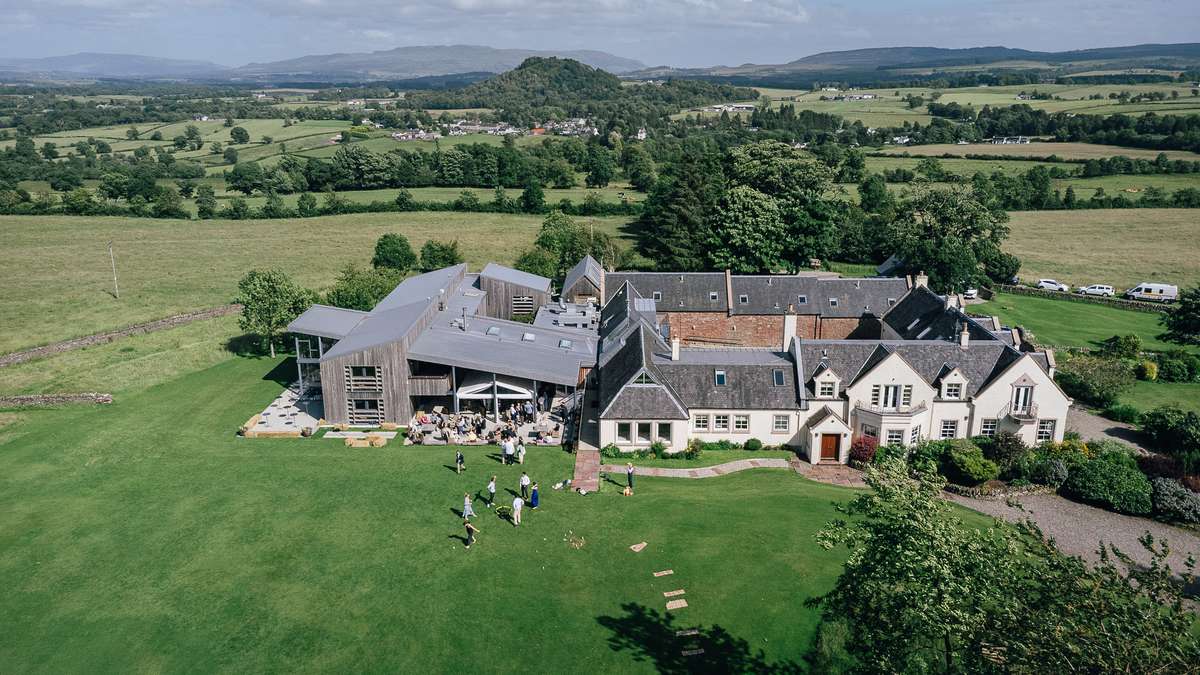 Aerial view of Ardoch Loch Lomond wedding venue and its grounds surrounded by Scottish countryside