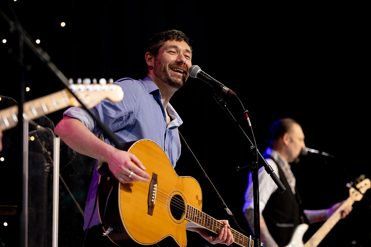 man playing guitar at Live Band Showcase at the Scottish Wedding Show 2025