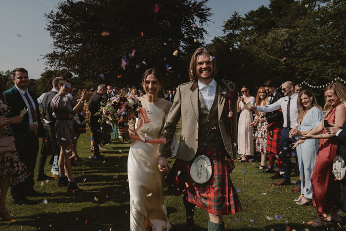 A Confetti Shot Of A Bride And Groom Outdoor At Hartree Estates