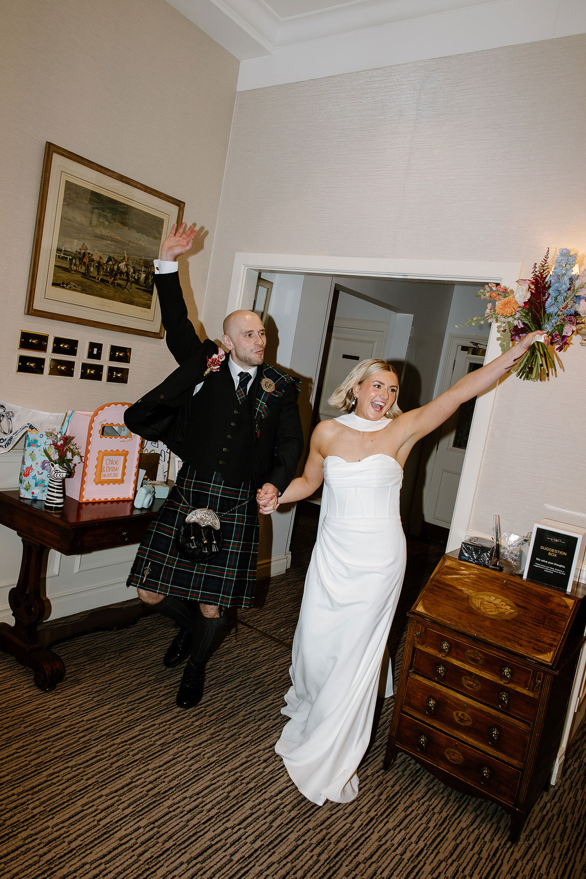 Newlywed couple entering their reception at Glaschu, Glasgow