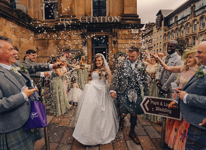 Confetti shot with crowd walking through