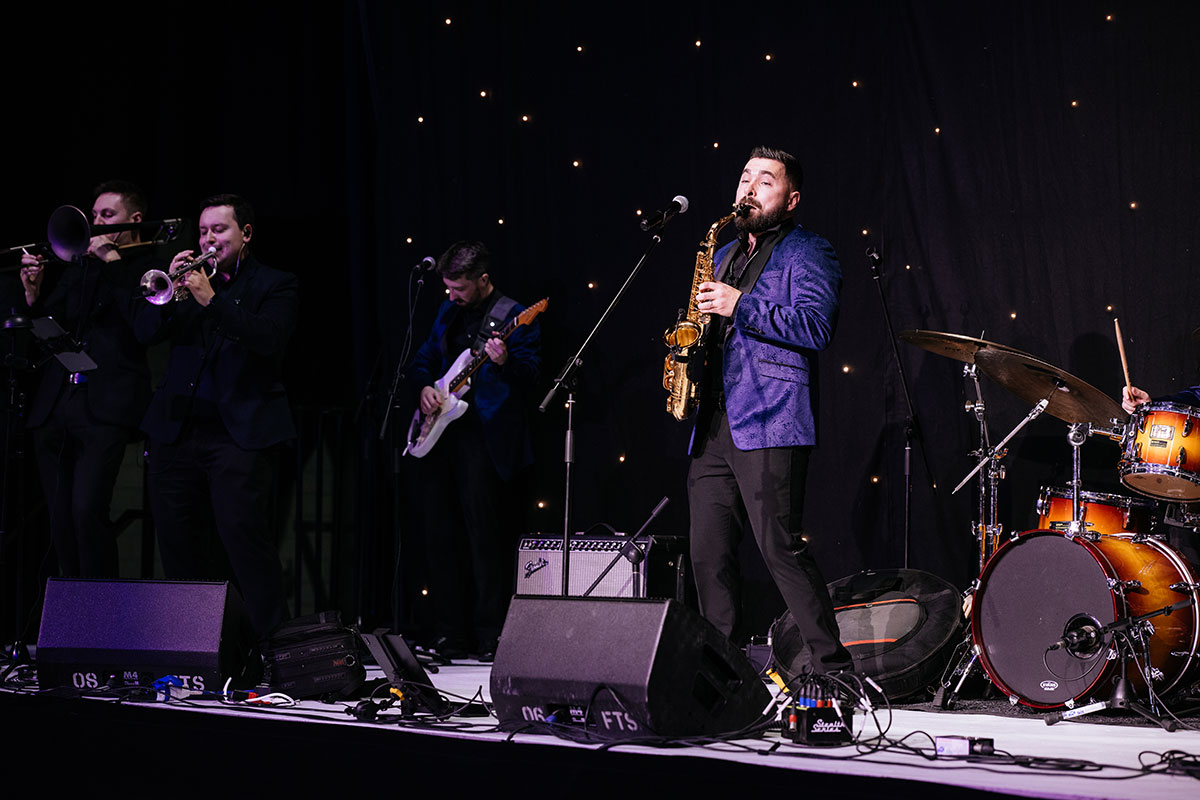 Live wedding band performing on stage at the Scottish Wedding Show in Glasgow