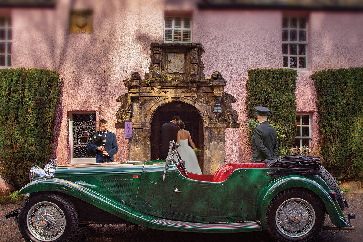 Bride arriving at Thackray House with a vintage green wedding car and bagpiper outside the entrance.