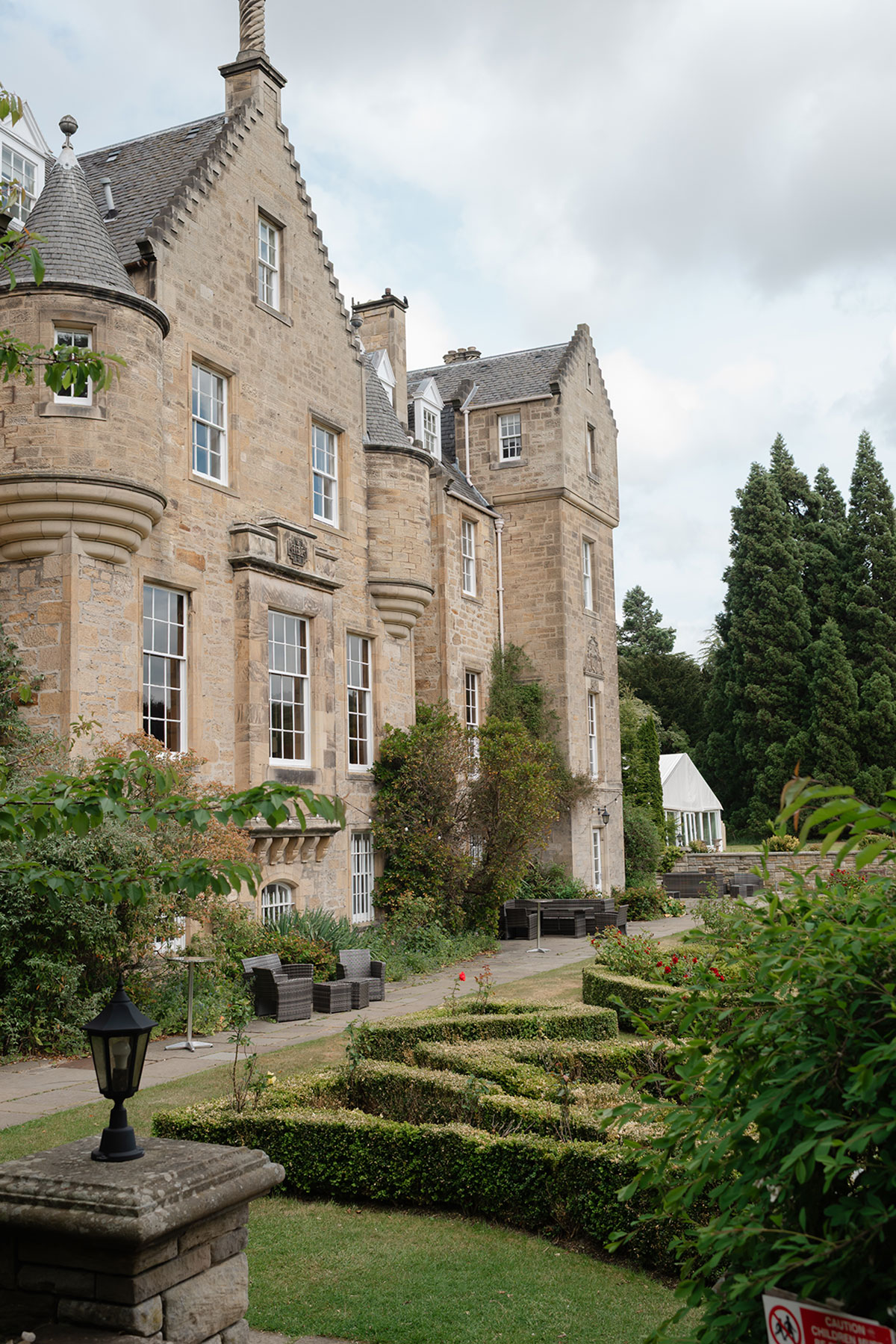 Exterior of Carberry Tower in East Lothian, the setting for an intimate home wedding ceremony