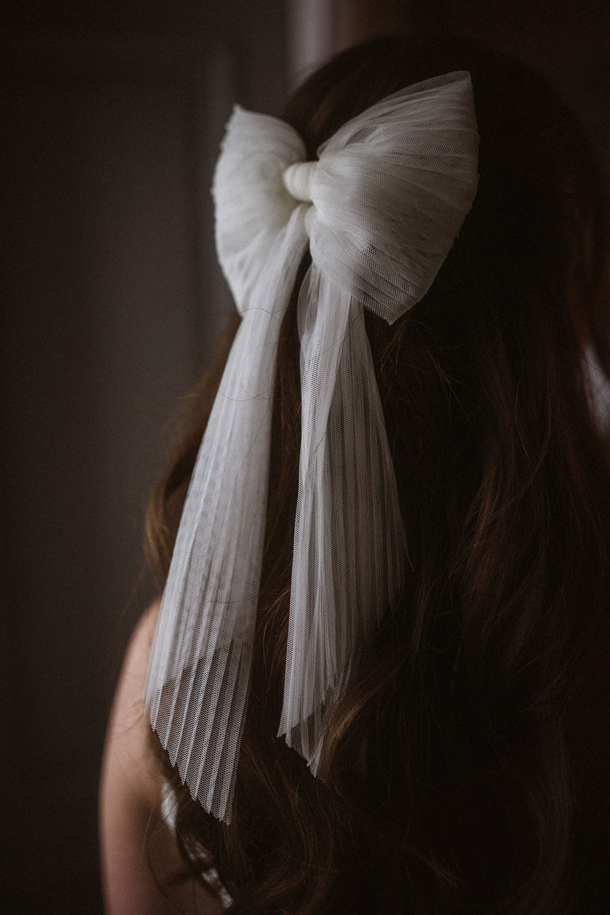 a large white hair bow