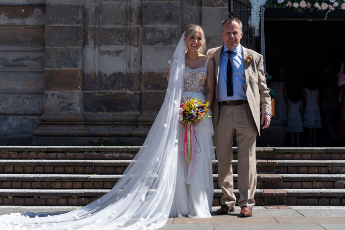 Bride with her father outside St Luke's