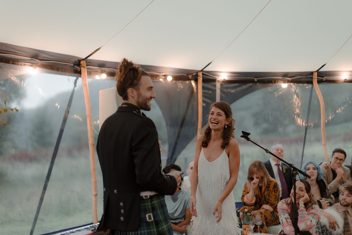 Carrick Castle Estate bride and groom wedding speeches in a bell tent