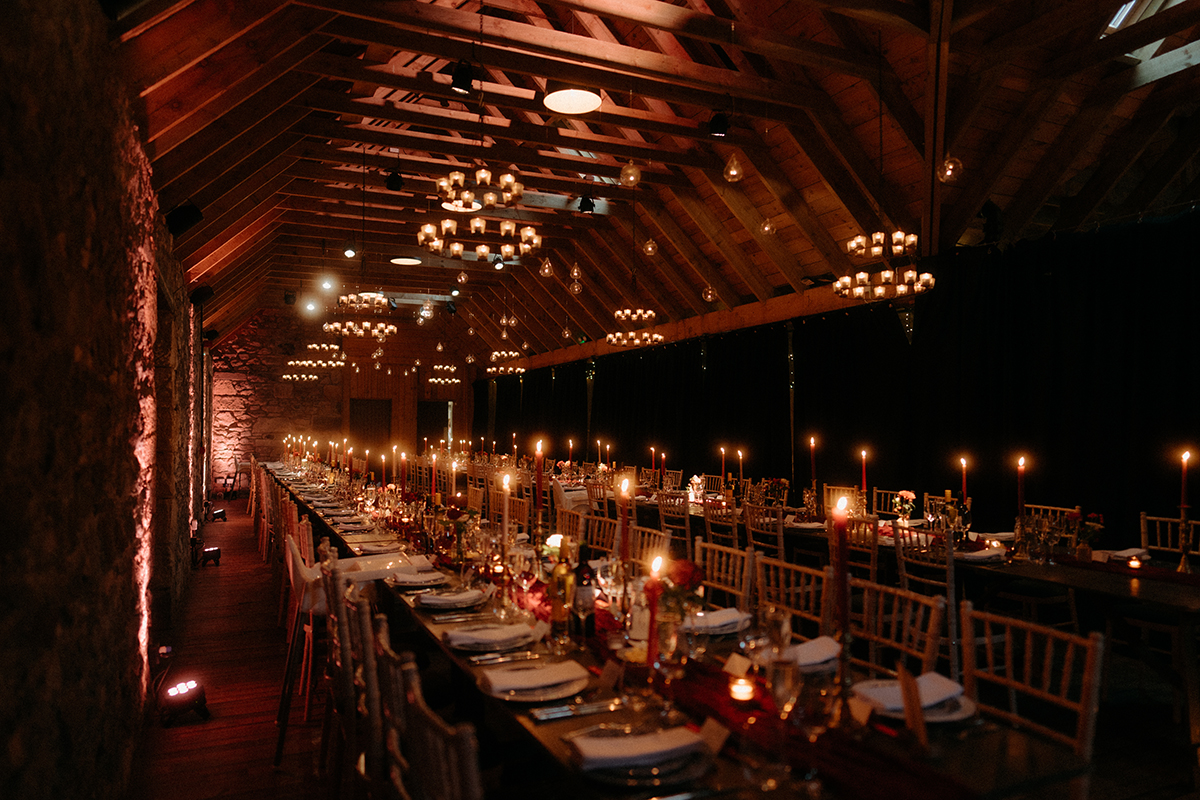 A candle-lit wedding table setup